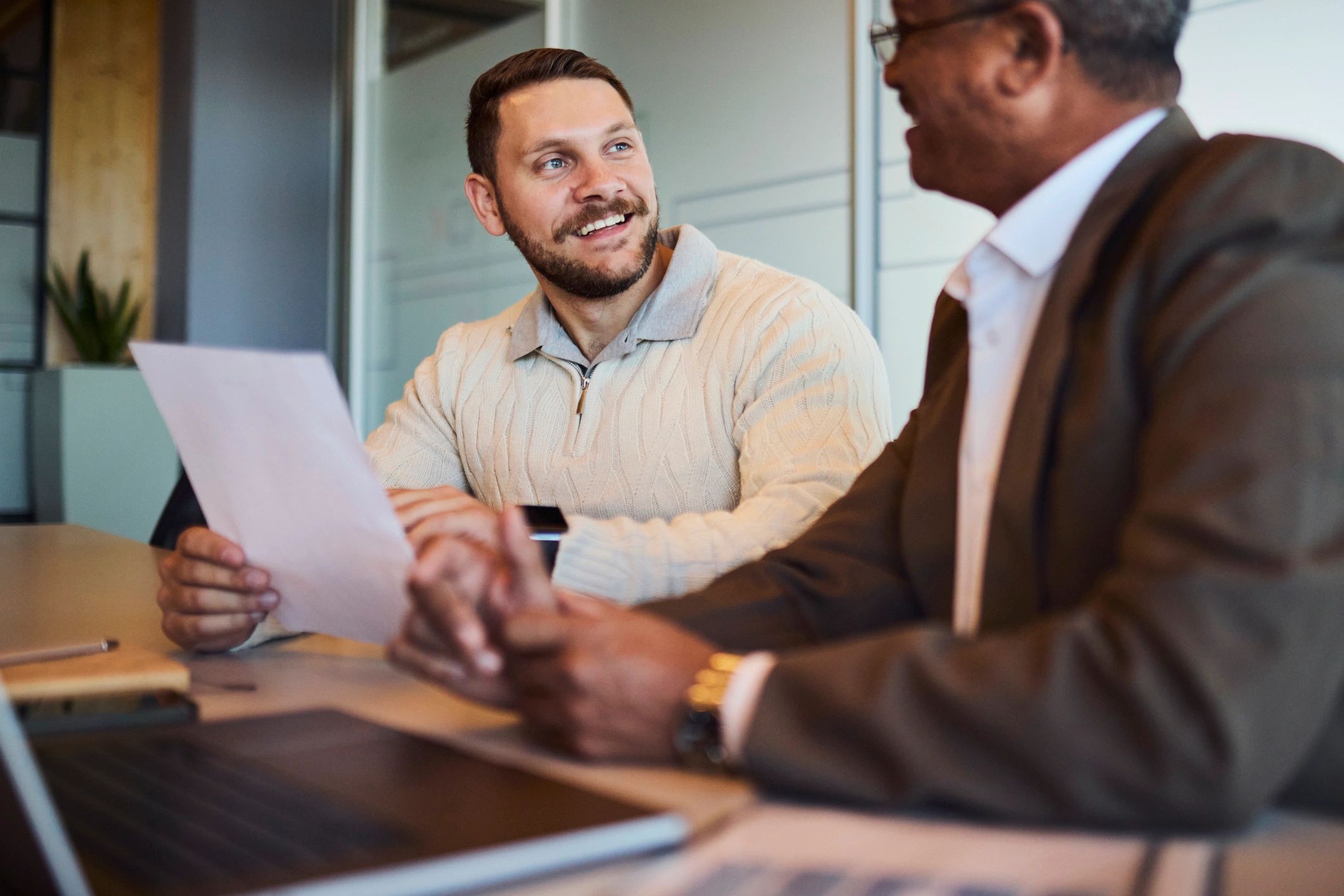 Benefits advisor meeting with client to review plan options